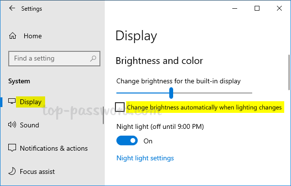 Click on Display.
Toggle off the Change brightness automatically when lighting changes option.