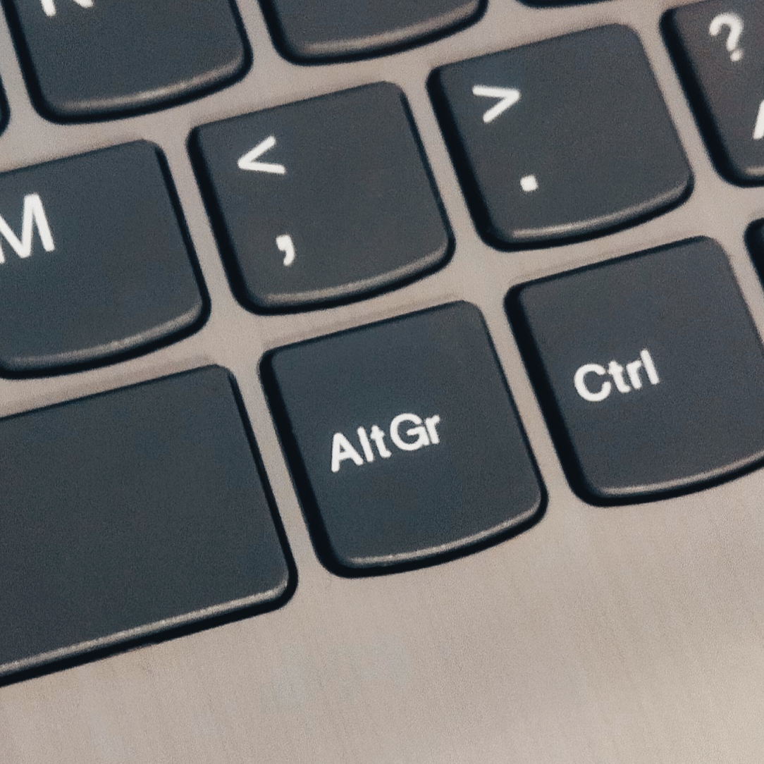 Close-up of laptop keyboard with insert key highlighted