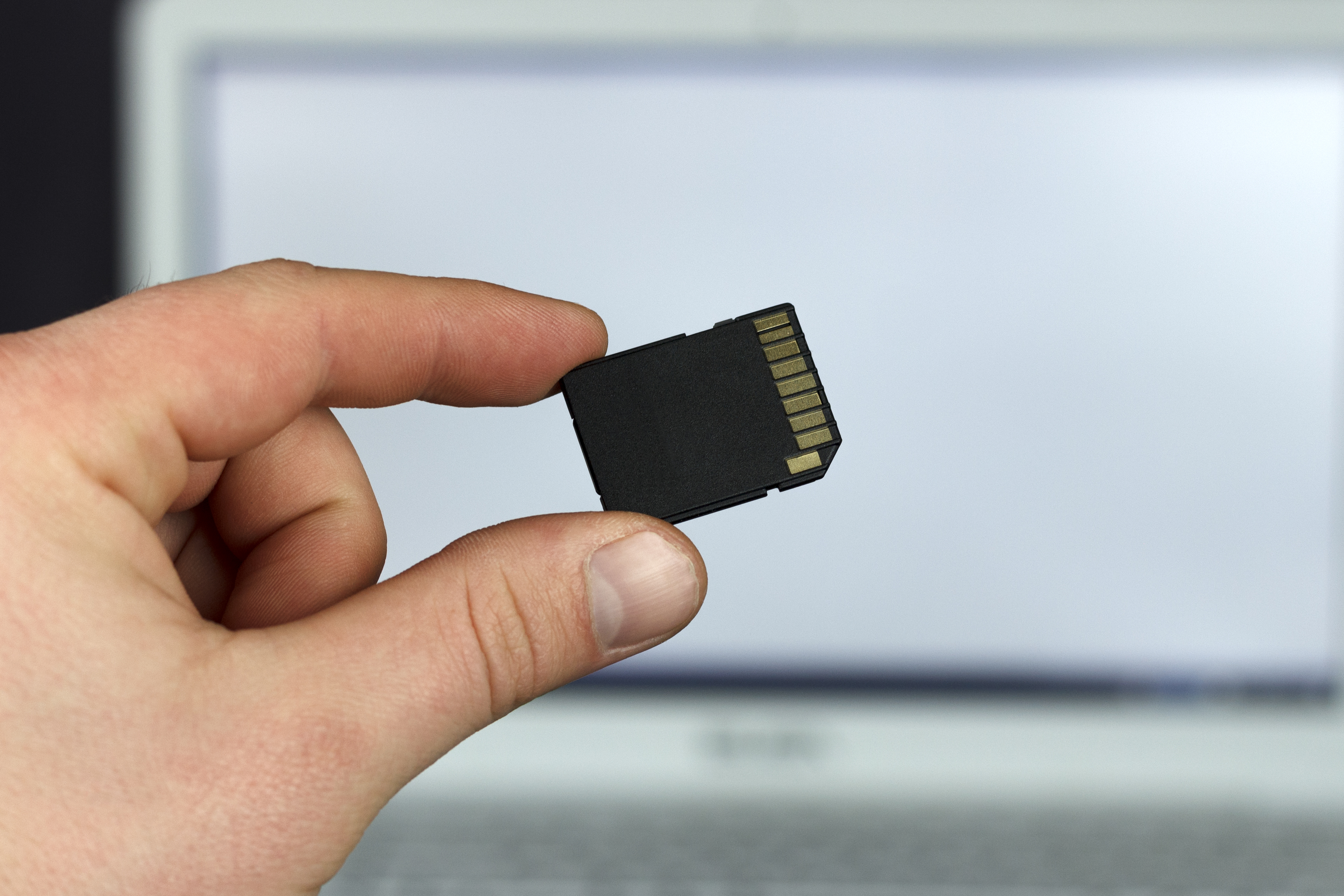 Insert the SD card into another compatible device or computer.
Access the SD card's storage and attempt to delete the photos.
